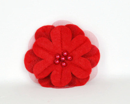Red soft felt flower brooch with sheer inset petals and pearl beads at the centre. 