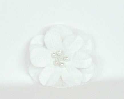 White soft felt flower brooch with sheer inset petals and pearl beads at the centre. 