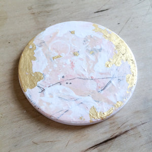 Hand painted coasters in pink and gold