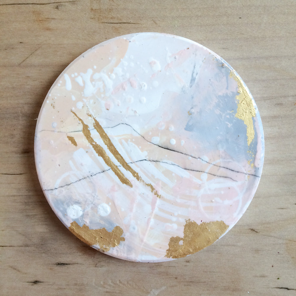 Hand painted coasters in pink and gold