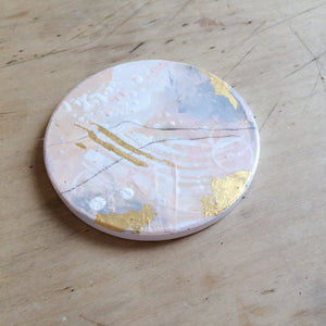 Hand painted coasters in pink and gold