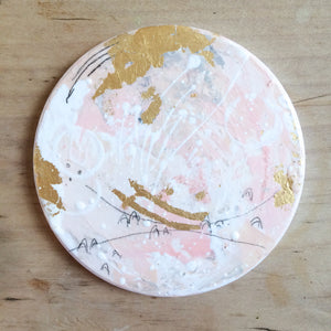 Hand painted coasters in pink and gold