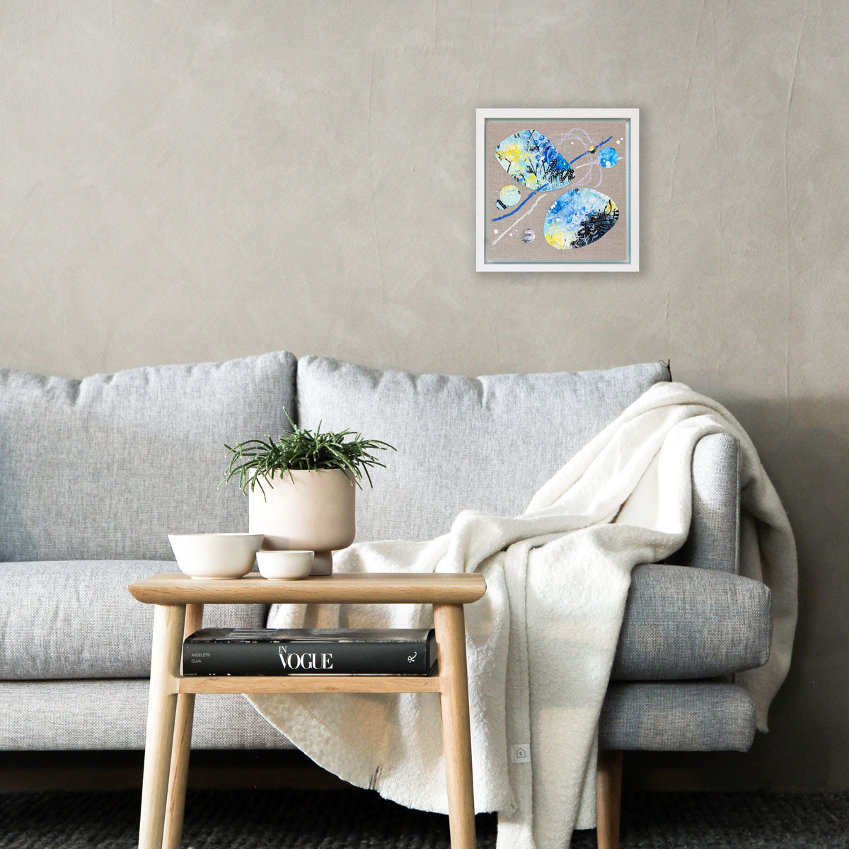 Love across tidelines |  Framed Pebble Painting on 20cm sq Canvas